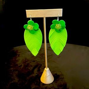 Brand new bright green flower and feather-like earrings; 3.5 inches long